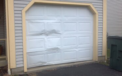 garage door damaged panel repair in San Diego